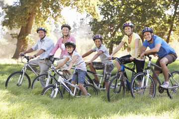 Obraz premium Three Generation Family On Cycle Ride In Countryside