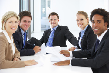 Group Of Business People Having Meeting In Office