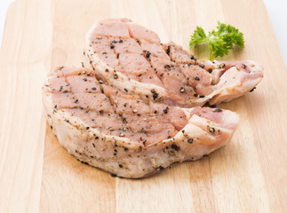 raw meat pork steak with black peppers