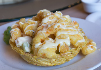 Shrimp fried with cream salad on taro cup fried