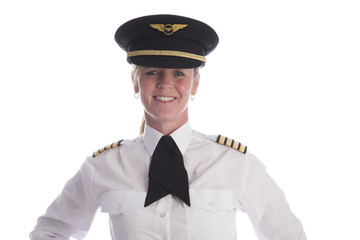 Female pilot in uniform and wearing her hat