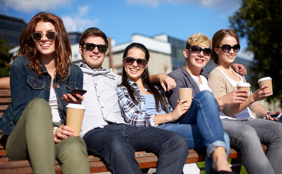 group of students or teenagers drinking coffee