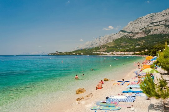 Amazing beach with people in Tucepi, Croatia