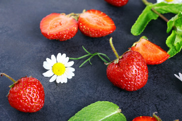 Fresh strawberries on a black background