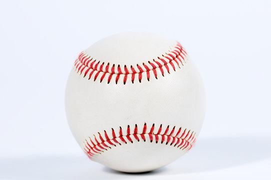 Single baseball with red knit.