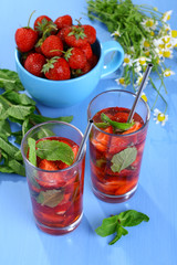 Cocktail with fresh strawberries and mint