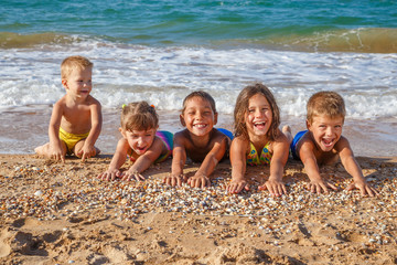 Five kids on the beach