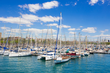 Fototapeta na wymiar Sailboat harbor, beautiful sail yachts in the sea port, modern