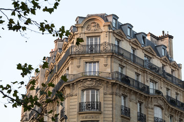 corner of of typical house with balcony in Paris, France