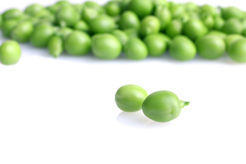 fresh green peas isolated on a white background