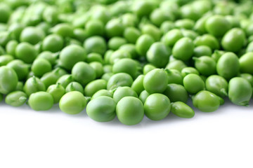 fresh green peas isolated on a white background