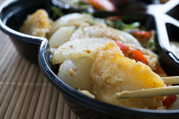 closeup in stir fried curried with fish