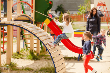Children at the playground  - 84464346