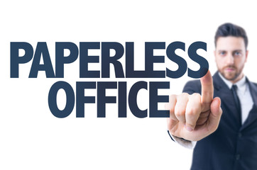 Business man pointing the text: Paperless Office