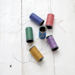 bobbins with thread on the table