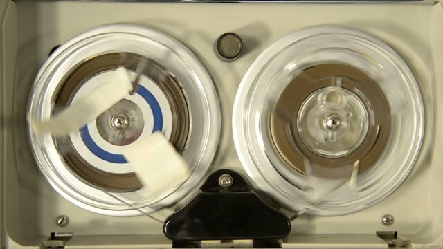 Aerial view of an old portable reel to reel mini tape-recorder