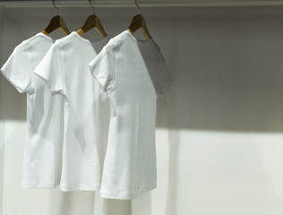Three White T-Shirts in Wardrobe