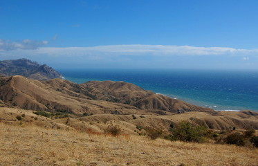 Sunny day on the mountain coast of the Black Sea. Kara-Dag, East Crimea.
