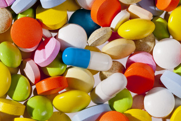 background of colorful different medical pills