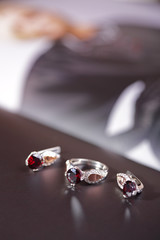 Beautiful gold ring and earrings with red gemstones.