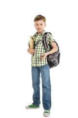 school boy in jeans with a backpack isolated
