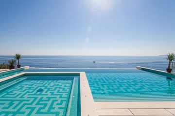 Luxury swimming pool and blue water
