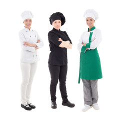 full length portrait of three young women chefs isolated on whit