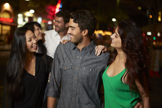 Group Of Friends Enjoying Night Out Together