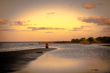 Person watching a sunset on the Chesapeake Bay in Maryland