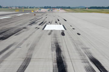 Skid marks on runway