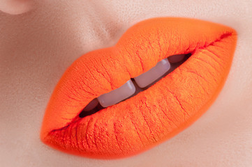 Fototapeta premium Beautiful acid orange lips