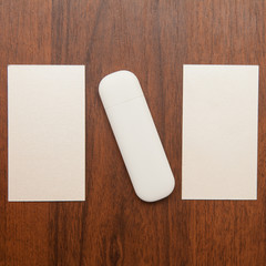 business cards and flash card on a wooden background
