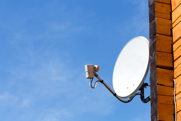 Satellite antenna on the wall