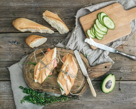 Salmon, avocado and thyme sandwiches in baguette tied up with