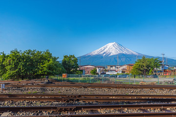 kawaguchiko railroad tracks with Mount Fuji  in summer