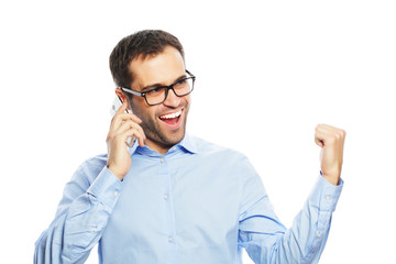 Successful gesturing business man with mobile 