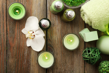 Beautiful spa composition with candles on table close up