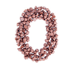 Alphabet from chocolate chips on white background