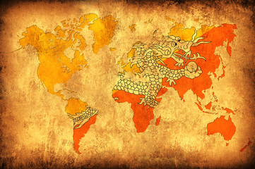 The flag of Bhutan in the outline of the world map