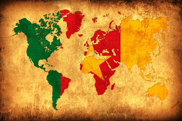 The flag of Cameroon in the outline of the world map