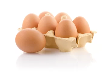 Abwaschbare Fototapete Brown eggs in the package © bajinda
