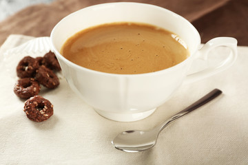Cup of coffee on table, closeup
