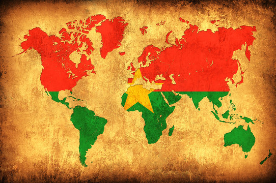 The flag of Burkina Faso in the outline of the world map