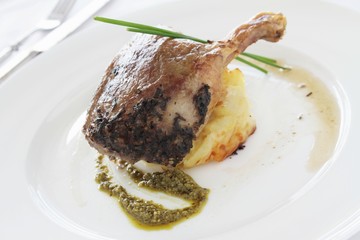 confit duck plated meal