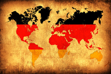 The flag of Germany in the outline of the world map