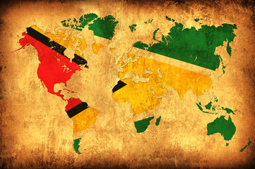The flag of Guyana in the outline of the world map