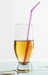 Glass of water on table on light background