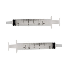 old plastic syringe  for children's medicine, isolated on white