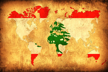 The flag of Lebanon in the outline of the world map