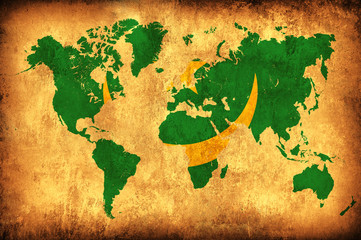 The flag of Mauritania in the outline of the world map